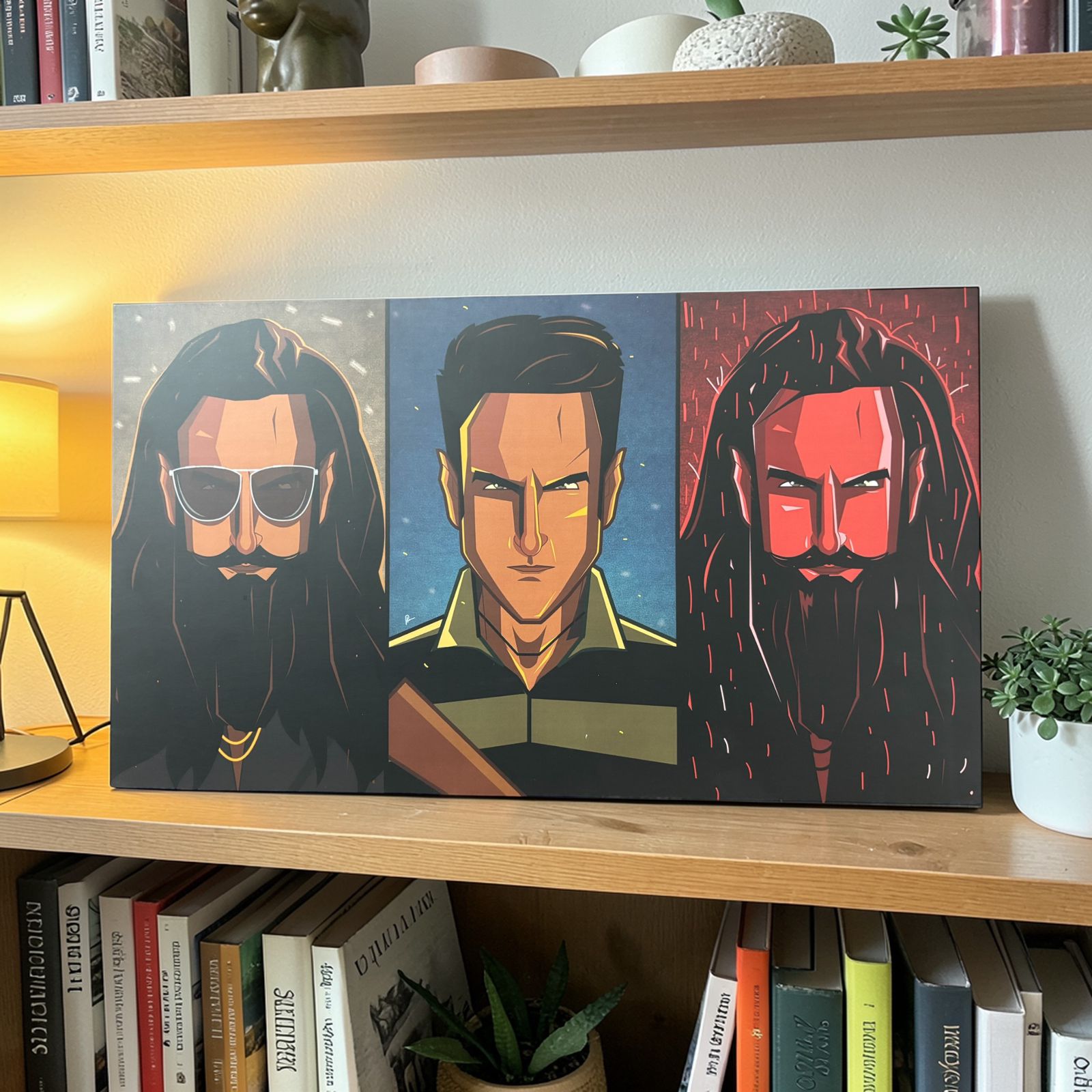 Triple panel character wall art in geometric comic style with bold red and black portrait design by Graphicurry