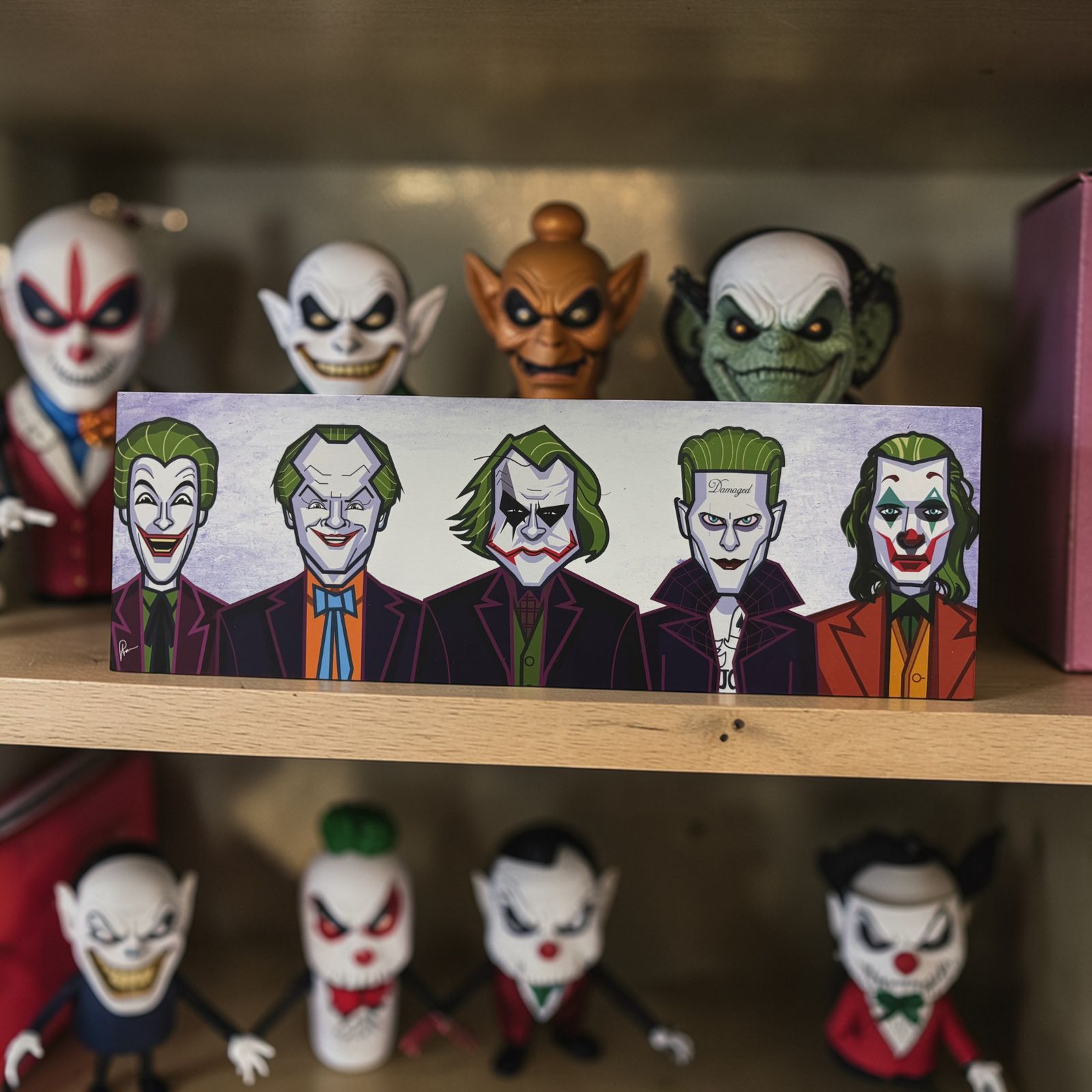 Dark clown villain wall art inspired by iconic Joker character
