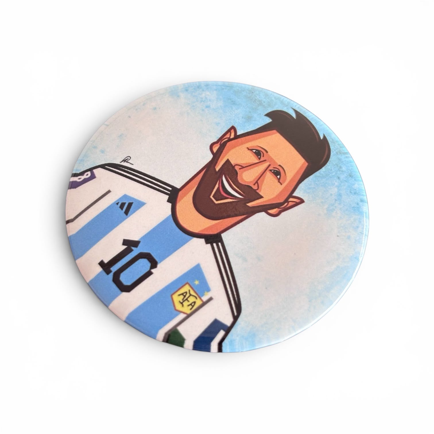 Lionel Messi button badge attached to a backpack
