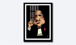 Framed Godfather Poster. Caricature Art by Prasad Bhat showing Don Corleone sitting in his iconic pose with a red pocket rose, his one hand held up and against a black backdrop. 